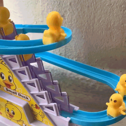 Animated close-up of ducks moving along the blue track
