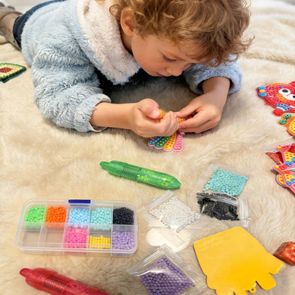 Finished unicorn and character bead crafts